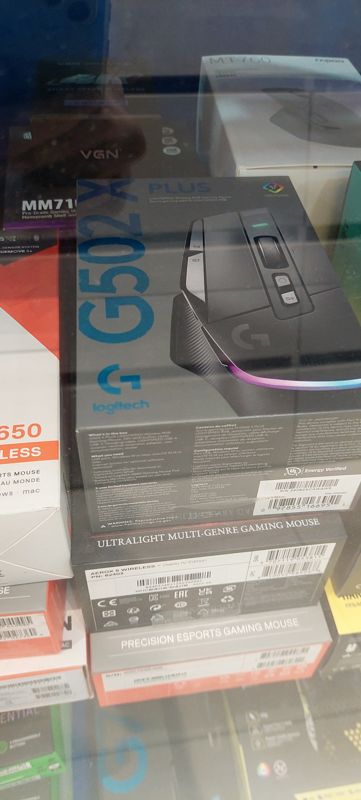 Игровая мышь Logitech G502 X Plus в коробке; ниже SteelSeries Aerox 5 Wireless Diablo IV Edition и Precision Esports