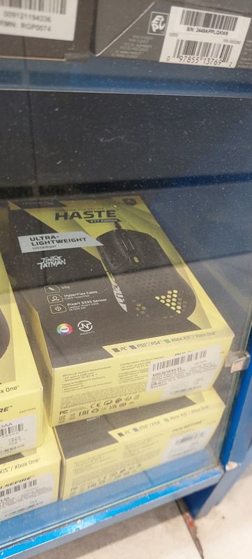 Игровая мышь HyperX Pulsefire Haste TTT Edition в коробках; сверху коробка Logitech G305