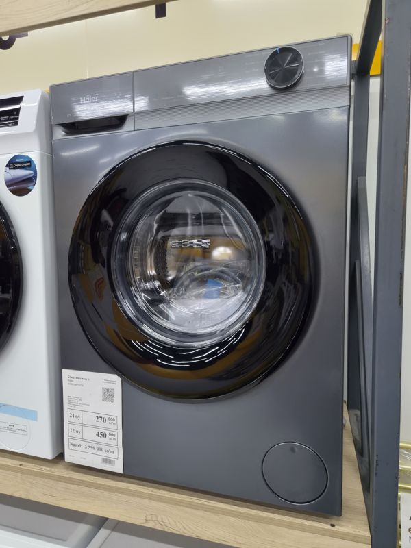 Стиральная машина Haier HW60-BP1227S, 6 кг, тёмно-серая, на полке в зале